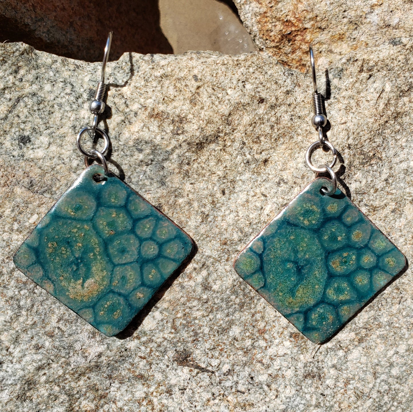 Pair of enameled copper earrings blue and yellow beige patterned square