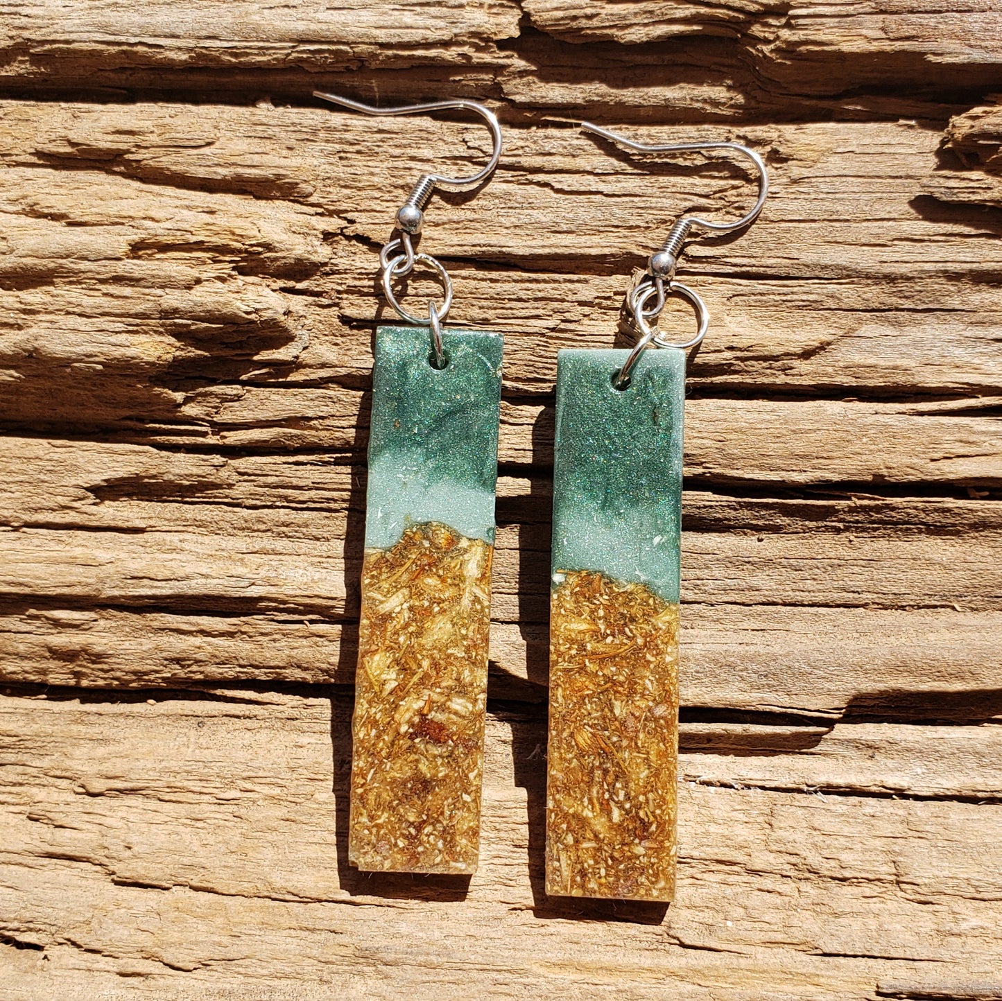 Pair of 2" rectangle bar earrings with green and gold pattern with dried flowers