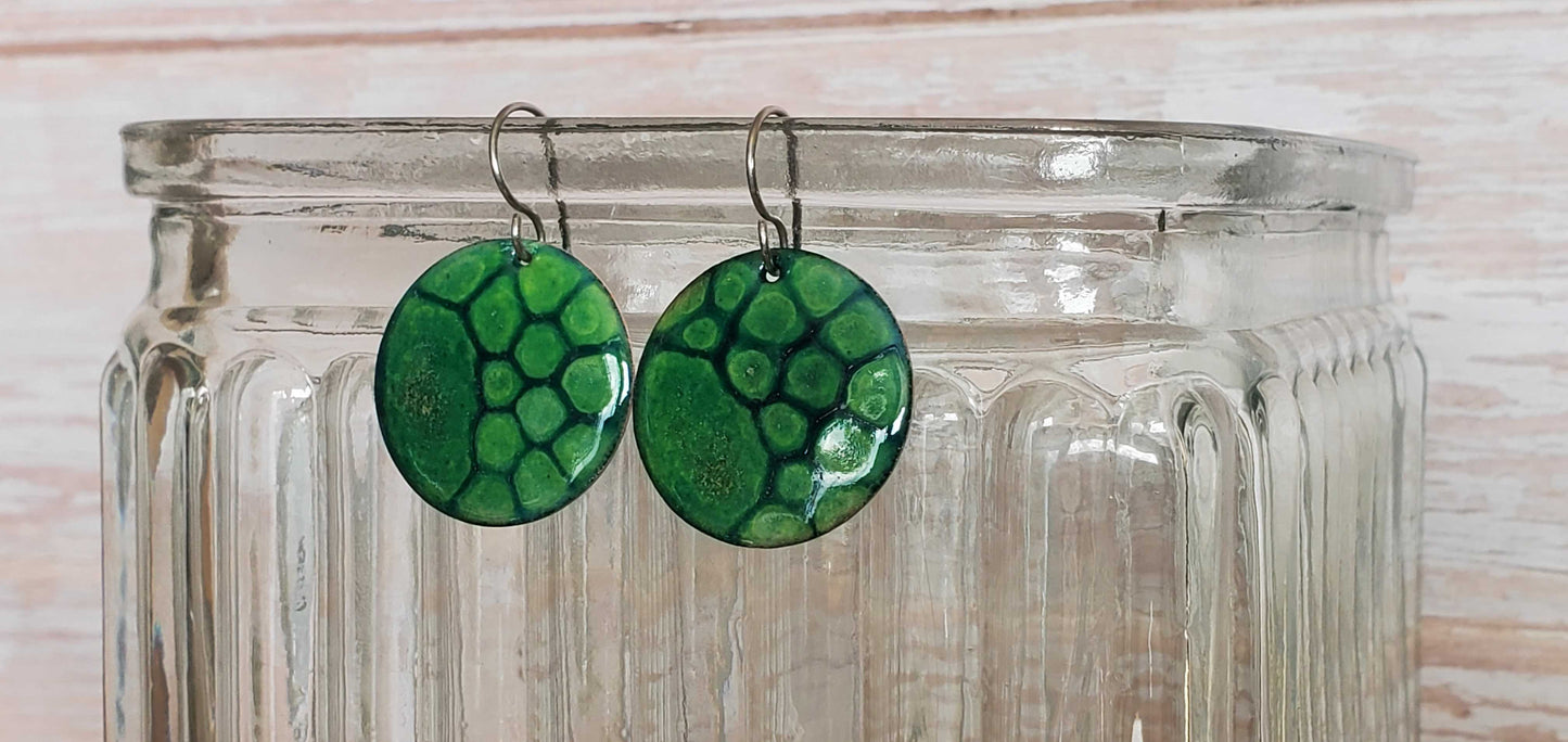 Green copper enamel earrings reminiscent of a turtle shell design
