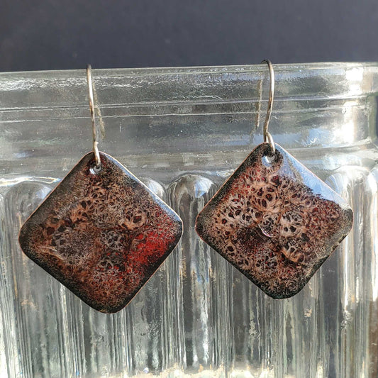 Pair of pink and red copper enamel earrings with textured surface