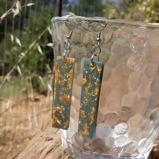 Boho dangle earrings with blue and gold pattern made from dried jasmine flowers video