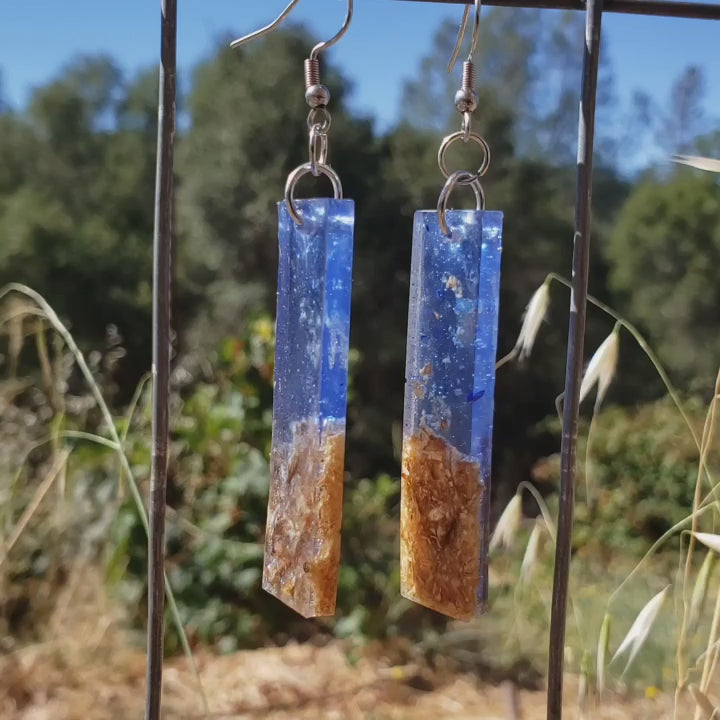 Minimalist blue earring that are transparent and natural